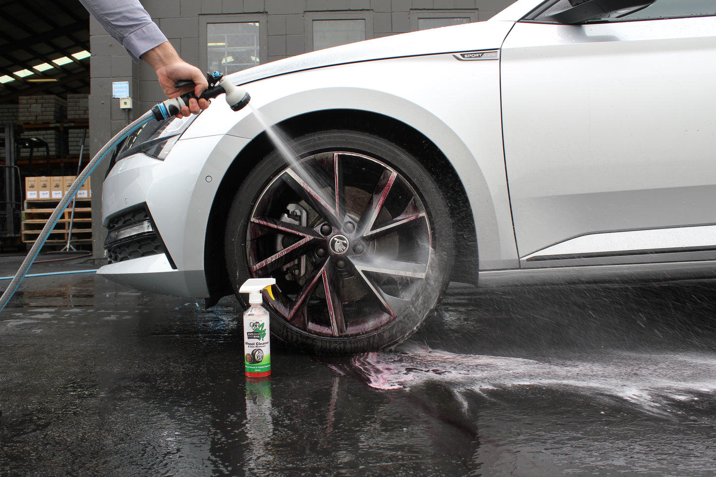 Spraying off Wheel Cleaner and Iron Remover at Bar's Bugs factory