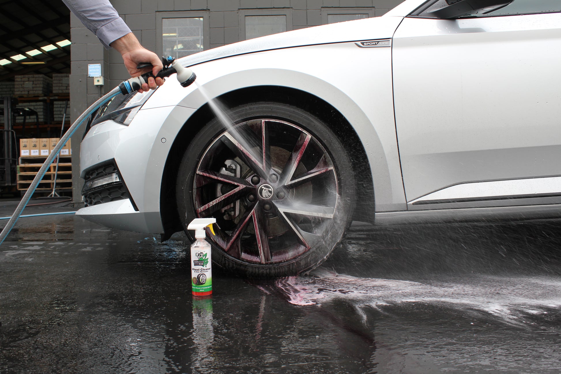 Spraying off Wheel Cleaner and Iron Remover at Bar's Bugs factory